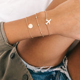 Around the World Flugzeug Armband